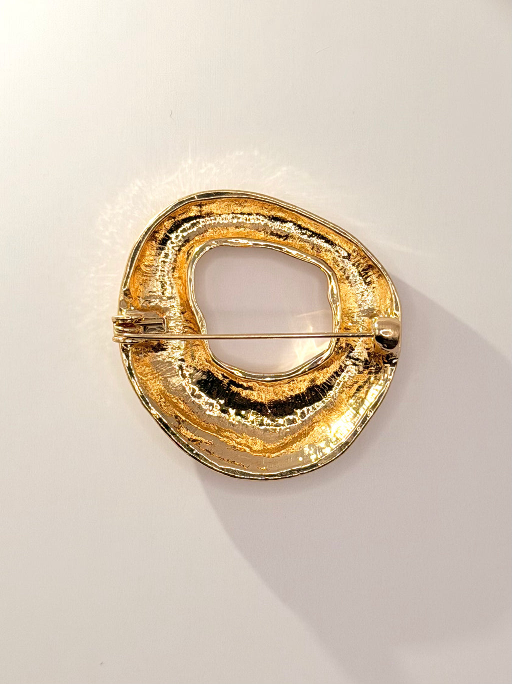 Round Sculptural Metal Brooch Back